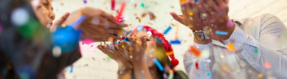 colleagues celebrating with confetti