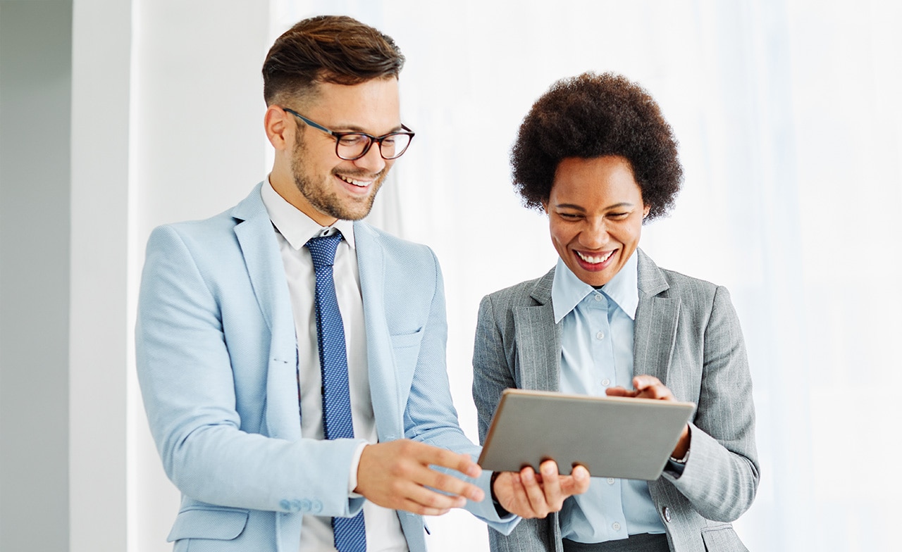 Consultants discussion business with a tablet