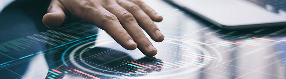 Person’s hand touching a digital device