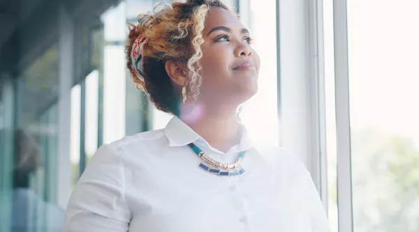 Consultant looking out a window