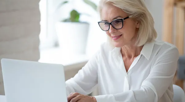 Business consultant working on a laptop