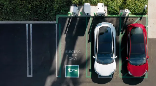 Electric cars charging viewed from above