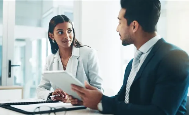 Man and women consulting on a project