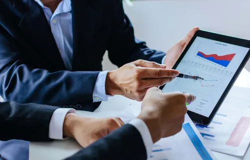 Two business people discussing on the results 