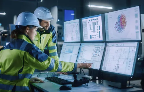 Operators looking at computer - AI Machine learning