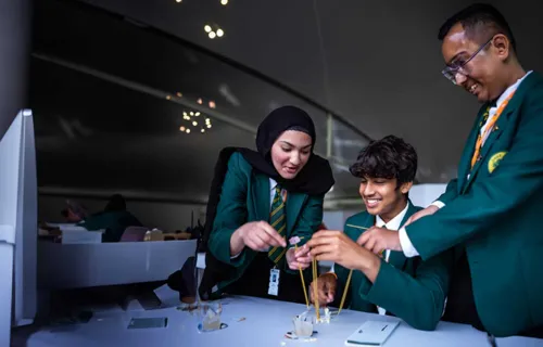 school students working on a project