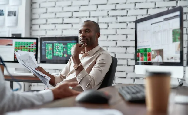 two traders discussing