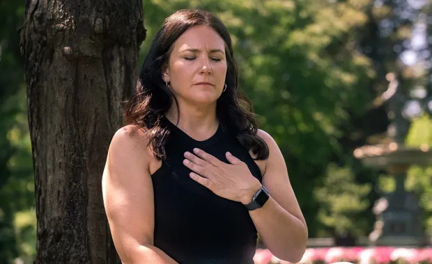 woman doing breathing exercises
