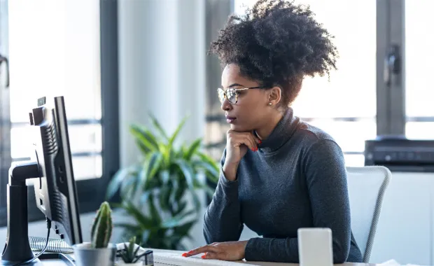 Woman working at her computer in the office