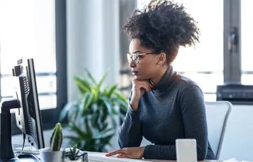 Woman working at her computer in the office